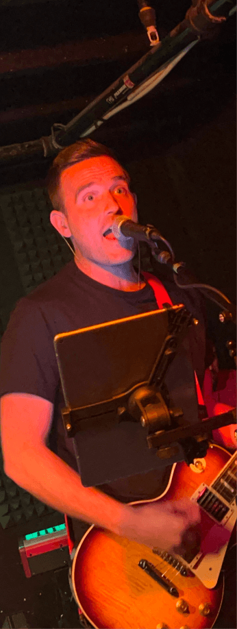 Landon of PopRox performing live